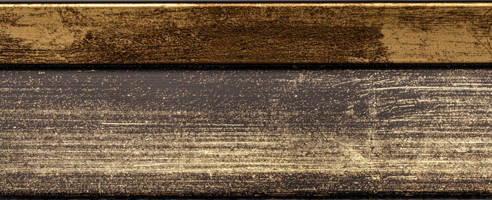 Gilded Ebony — blackened wood with burnished gold